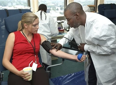 drawing blood from patient